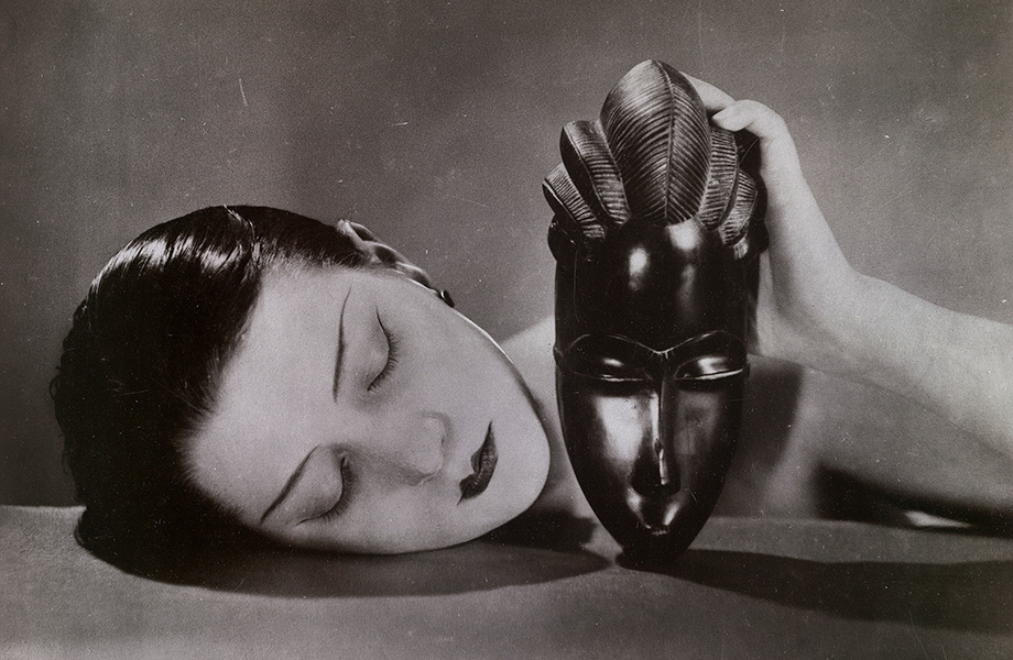 Man Ray Kiki with African mask 1926 National Gallery of Victoria © MAN RAY TRUST / ADAGP, Paris (licensed by Copyright Agency and photograph by Helen Oliver-Skuse / NGV).